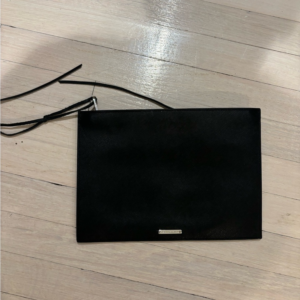 Black leather clutch bag